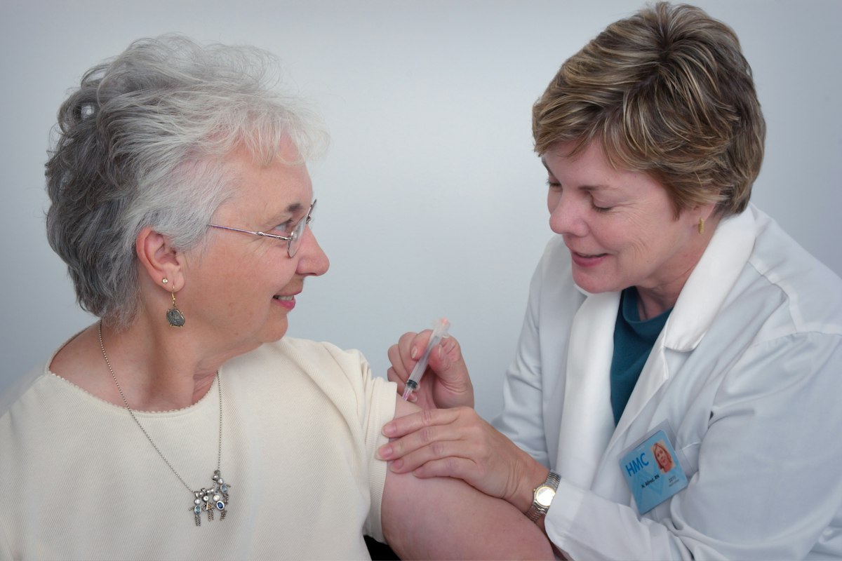 Professional caregiver offering calm support — stock photo for ambiance only